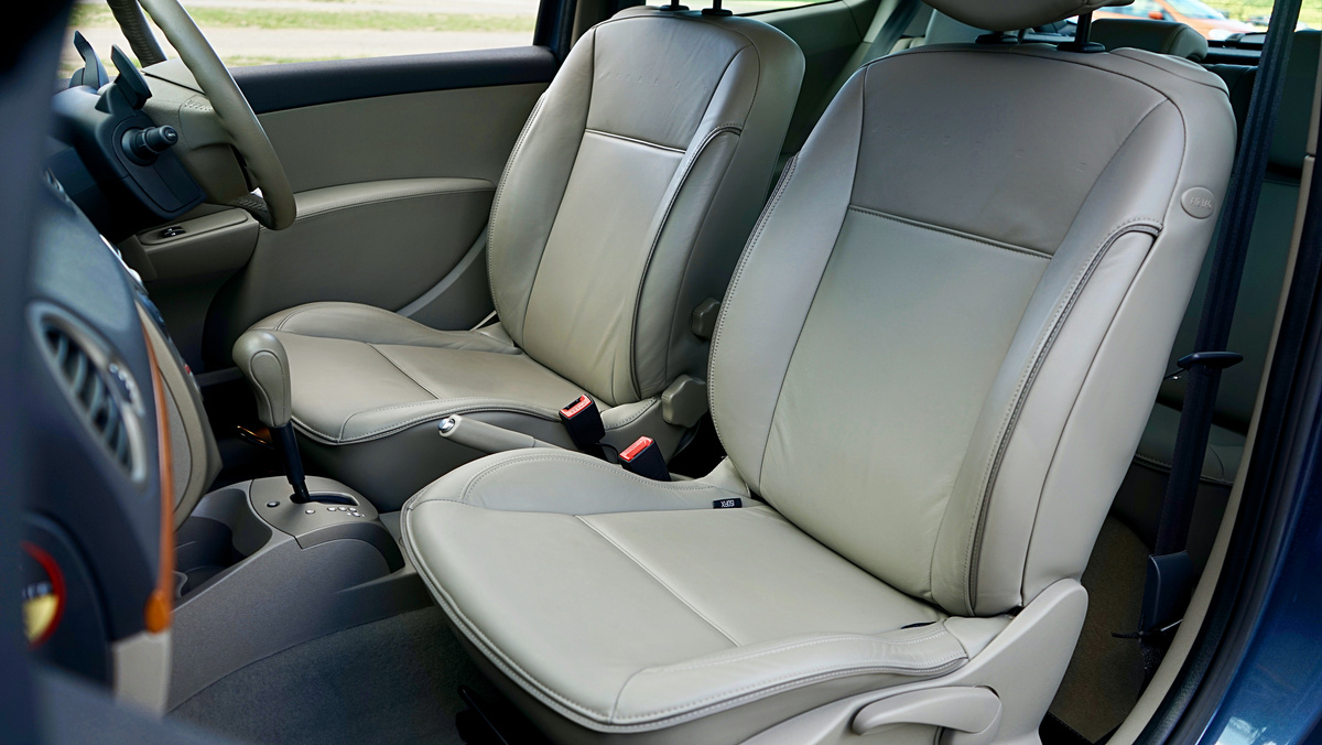 A Car Interior with Gray Leather Car Seats